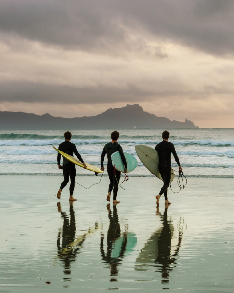 Surfers Heading to Catch the Waves - Seaflora Skincare People who surf use Seaflora's natural sun shield to get that UV protection.