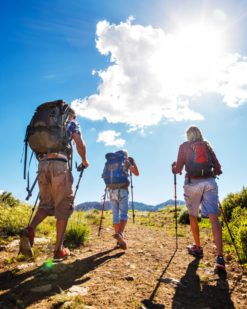 Hikers Ascending to the Mountain Summit - Seaflora Skincare People who hike use Seaflora's natural sun shield to get that UV protection.